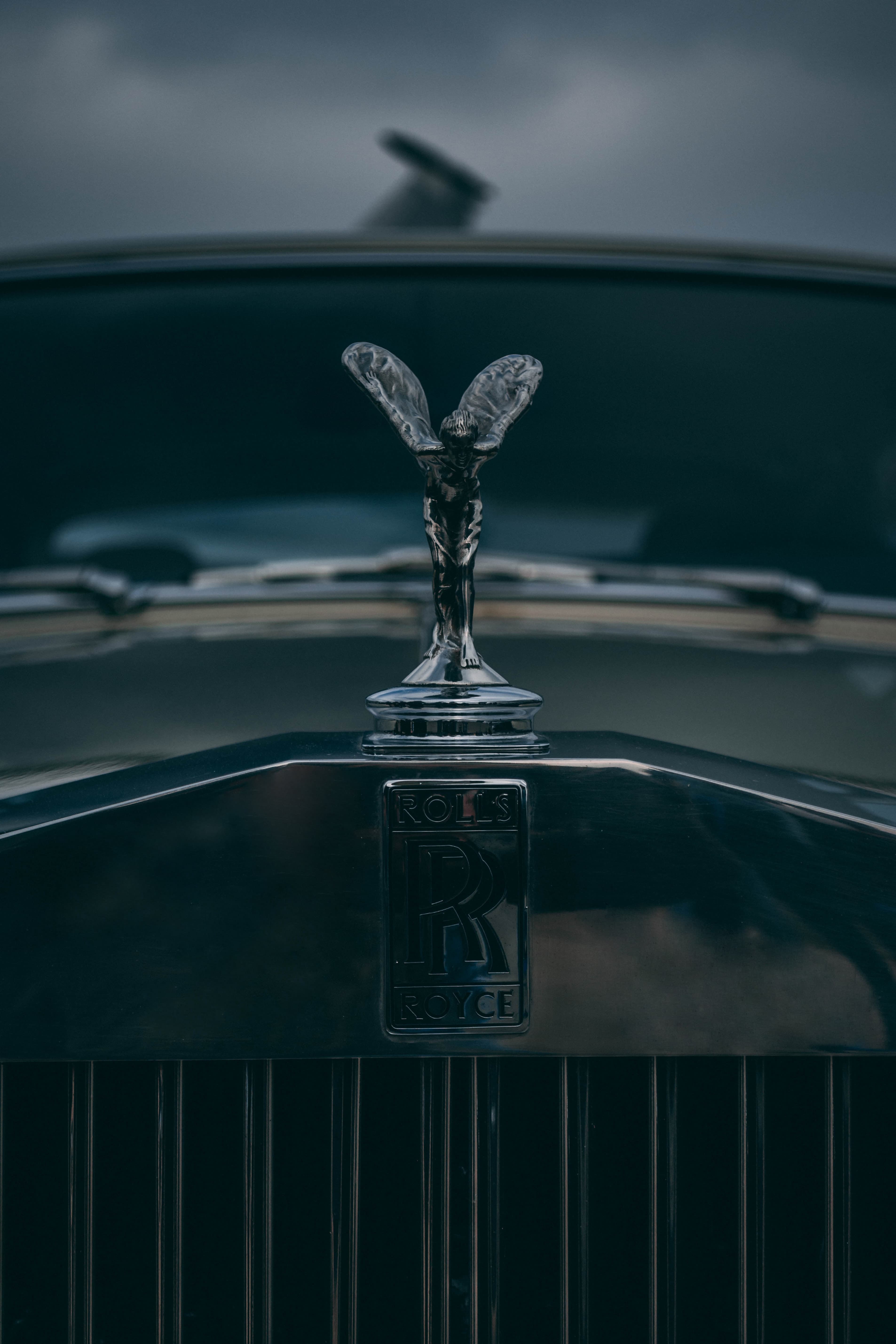 Rolls Royce Spirit of Ecstasy emblem — luxury brand identity